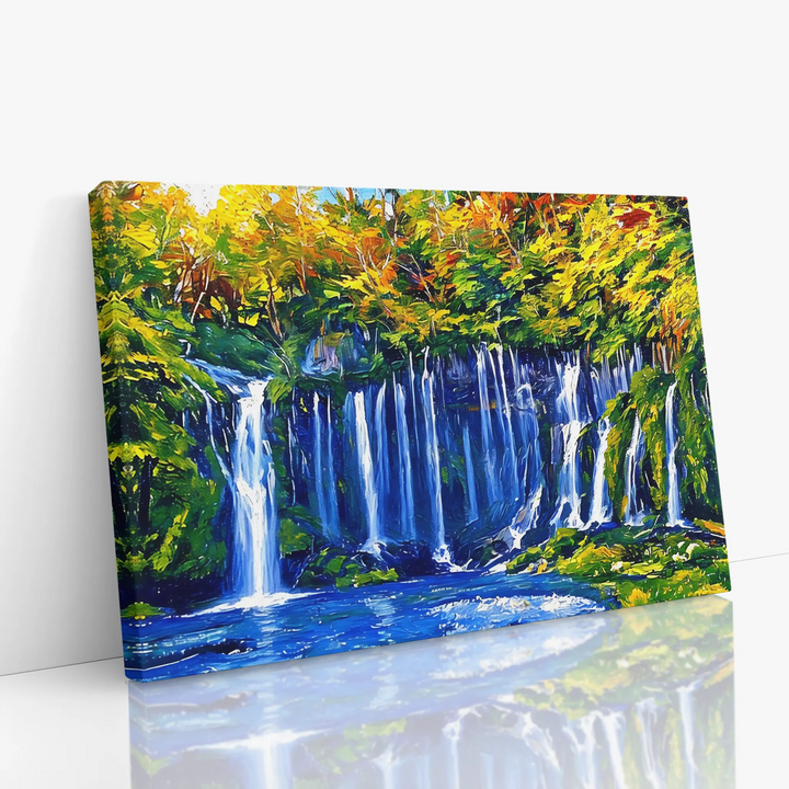 Canvas painting of a vibrant waterfall surrounded by lush, colorful foliage.