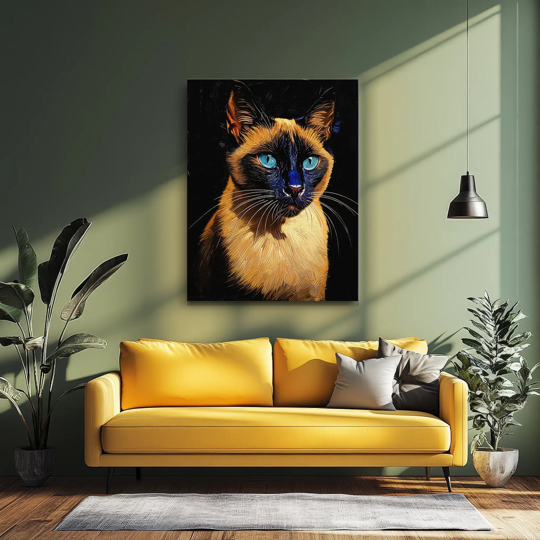A yellow sofa with gray pillows in a room featuring a large painting of a Siamese cat on the wall, surrounded by plants and a pendant light.