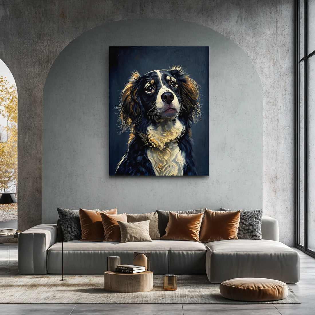 A modern living room with a large, realistic painting of a dog above a gray sectional sofa, accented with brown and beige pillows.